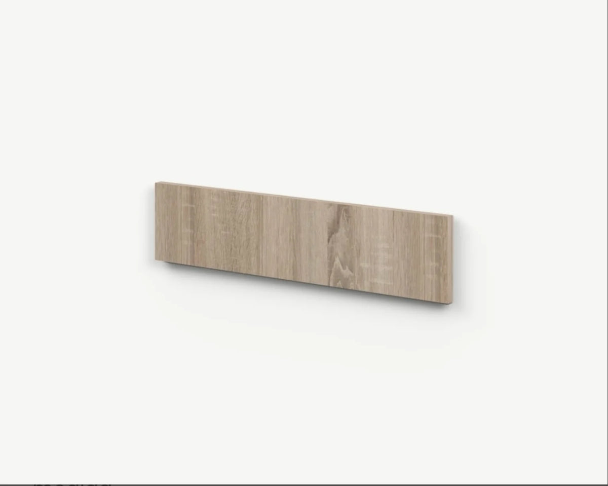 Frente de cajón de cocina a medida en acabado madera sobre fondo blanco.