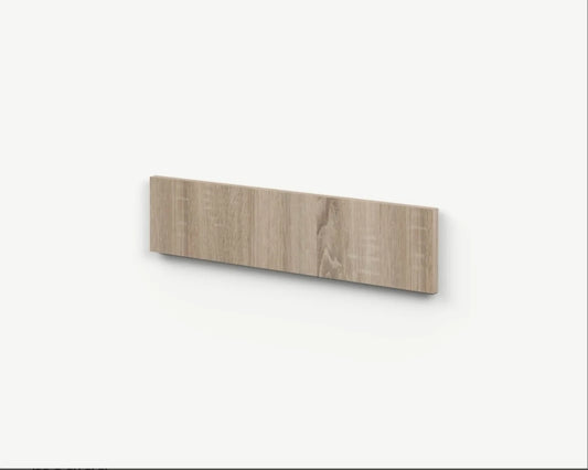 Frente de cajón de cocina a medida en acabado madera sobre fondo blanco.
